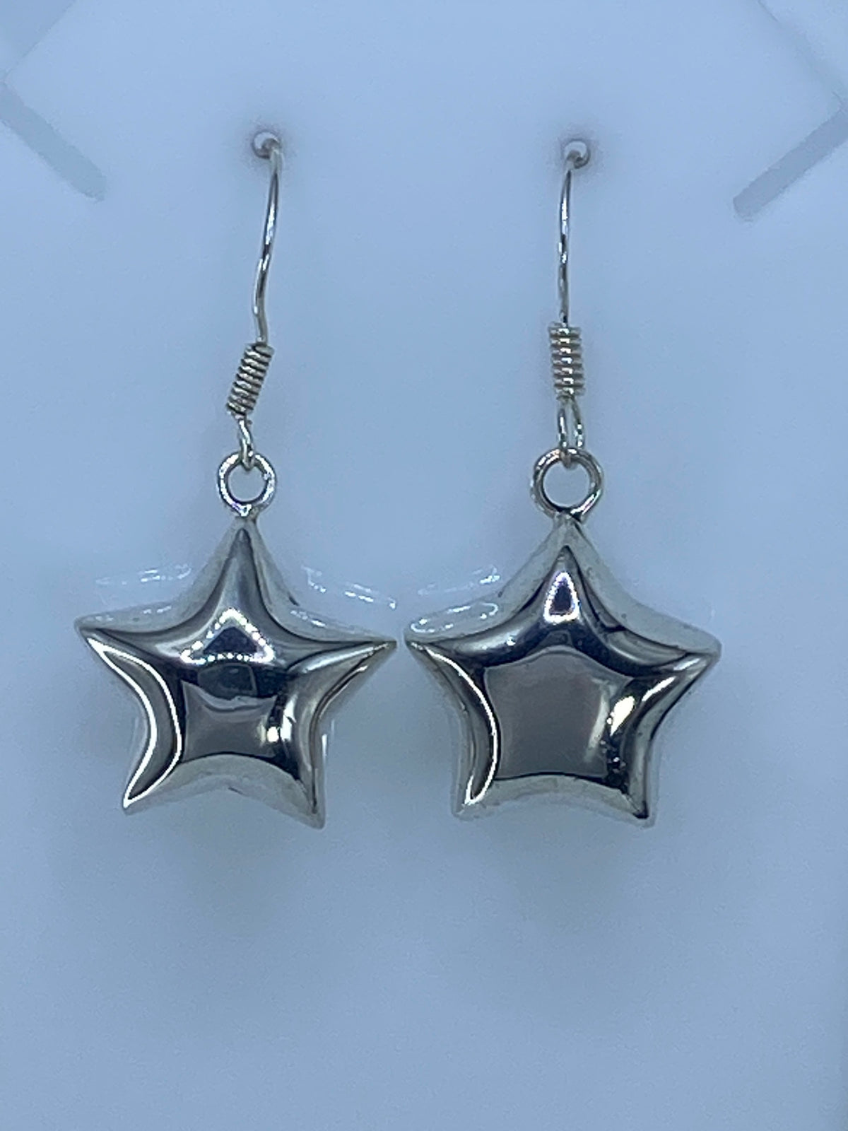 Par de aretes estrella de plata 925 cartoneado de Taxco con acabado espejo