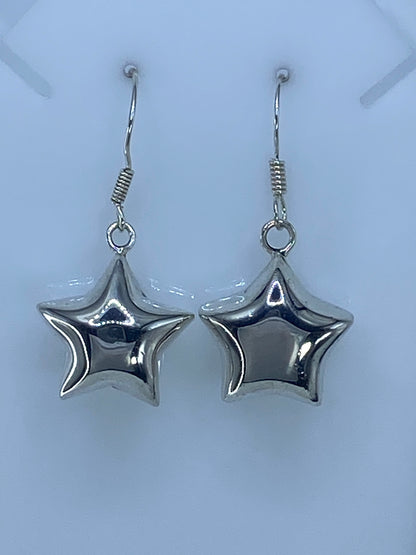Par de aretes estrella de plata 925 cartoneado de Taxco con acabado espejo