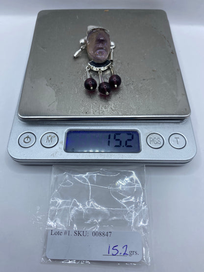 Reverso del dije de plata con marca MEXICO 925 y diseño repujado