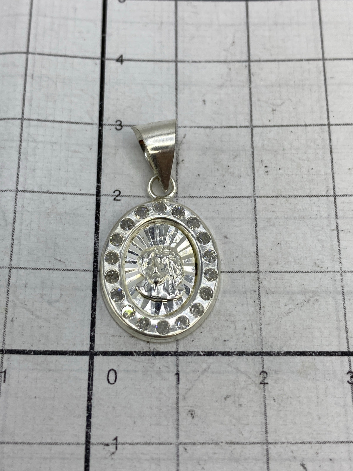 Reverso del dije mostrando el Quinto 925 y sello MEX