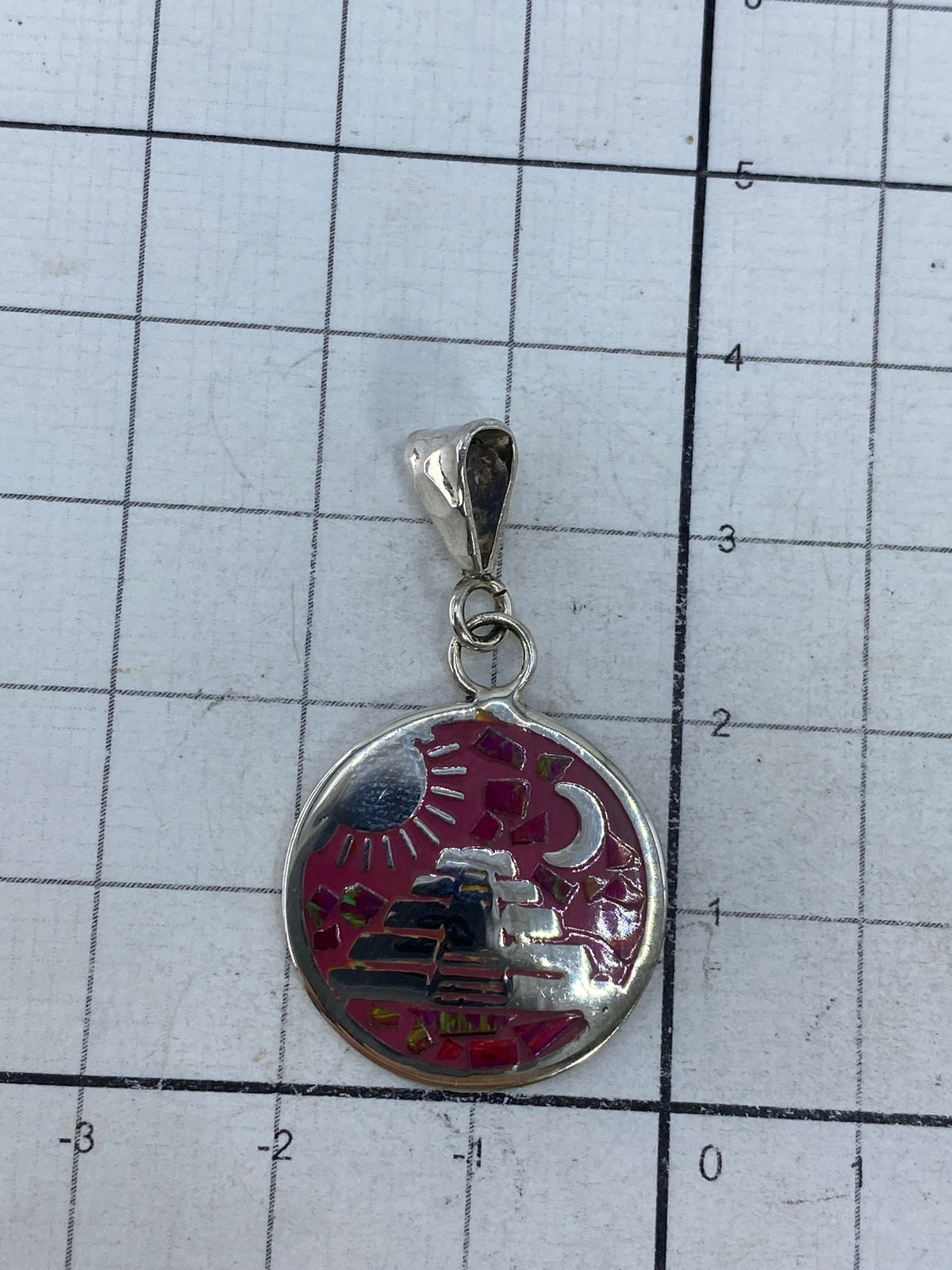 Dorso del dije de plata 925 con el Quinto de autenticidad México 925