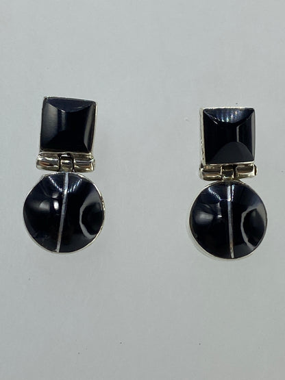 Aretes sobre escala de precision mostrando peso total 2.89 g