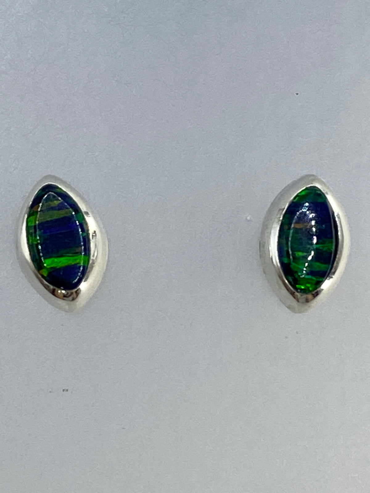 Aretes de botón en plata 925 de Taxco con Quinto visible