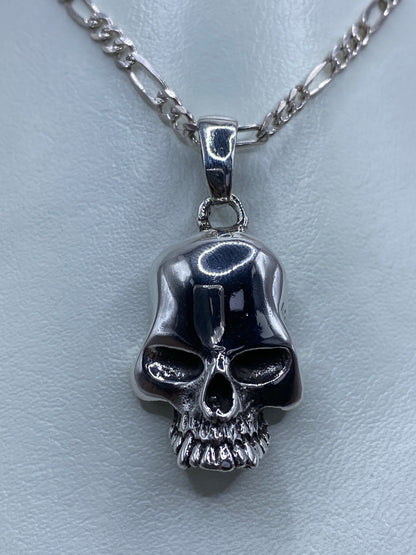 Dije calavera de plata 925 fundida con mandíbula texturizada en cadena figaro