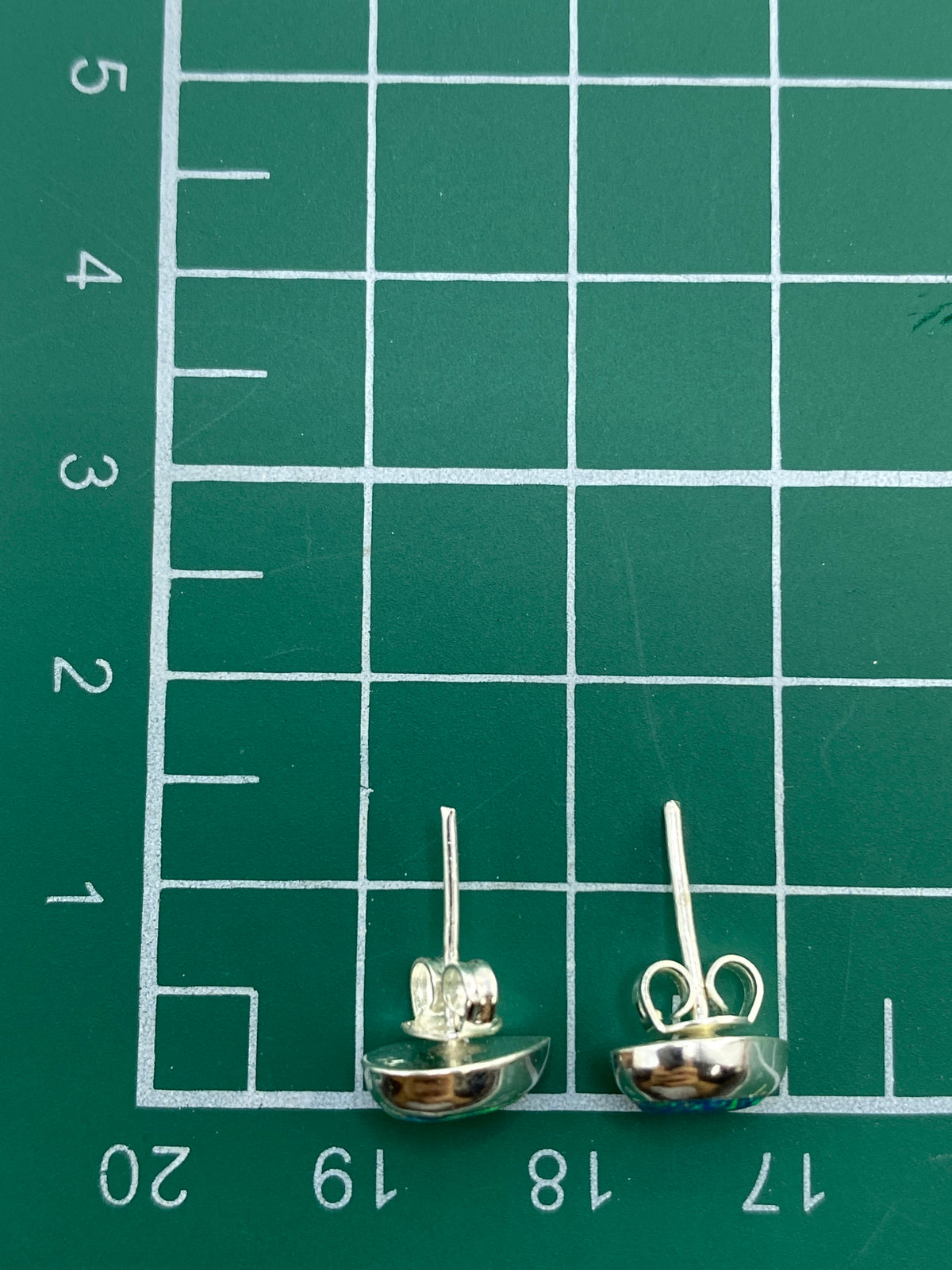 Aretes en estuche de presentación con certificado de autenticidad