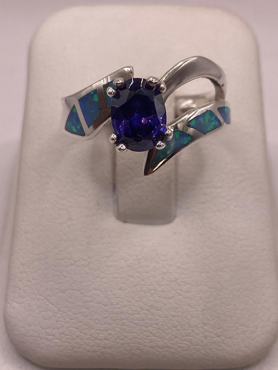 Anillo Contemporáneo Abierto con Ópalo de Fuego  y Zirconia  en Plata .950