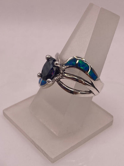 Anillo Elegante Curvo de Plata 950 con Ópalo de Fuego y Zirconia