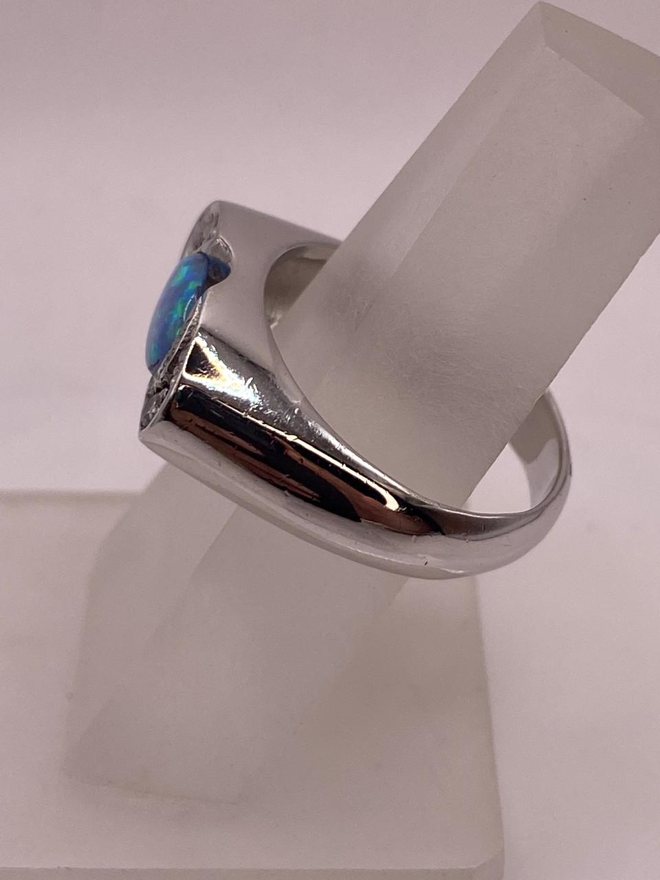 Anillo Elegante de Plata 925 con Ópalo de Fuego y Zirconia