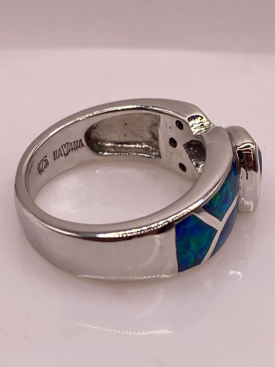 Anillo Elegante con Ópalo de Fuego Tornasol y Zirconia en Plata .925