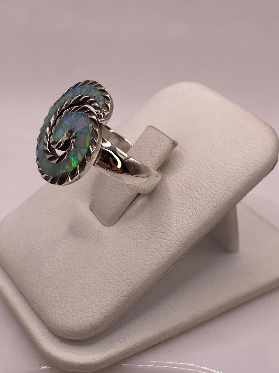 Anillo en Espiral con Ópalo de Fuego Tornasol en Plata .950