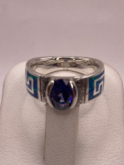 Anillo de Greca con Ópalo de Fuego y Zirconia en Plata .950, sello de autenticidad Plata Ley .925