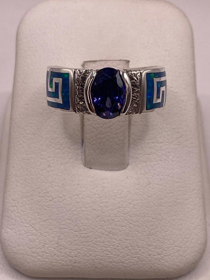 Anillo de Greca con Ópalo de Fuego y Circonia en Plata .950 en báscula mostrando peso