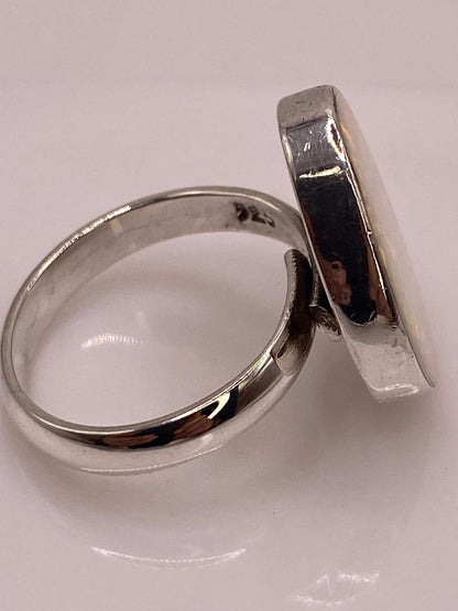 Anillo Minimalista Ajustable con Ópalo de Fuego en Plata .925, sello de autenticidad Plata Ley .925