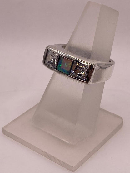 Anillo Moderno con Ópalo de Fuego y Circonias en Plata .925