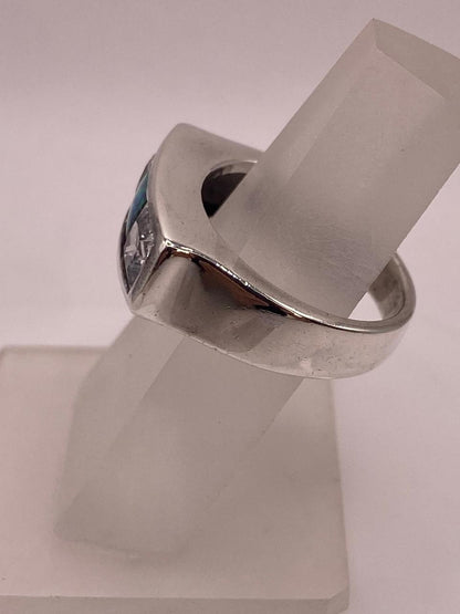 Anillo Moderno con Ópalo de Fuego y Circonias en Plata .925