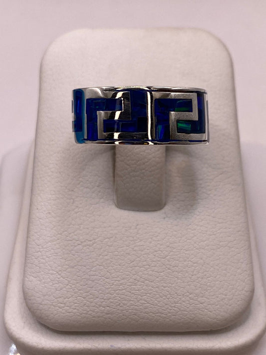 🔥 Anillo con Ópalo de Fuego Azul‑verde Diseño Greca en Plata Ley 950 en báscula mostrando peso