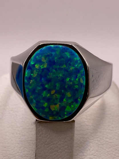 Anillo con Ópalo de Fuego Azul‑Verde Ovalado en Plata Ley 950, vista superior