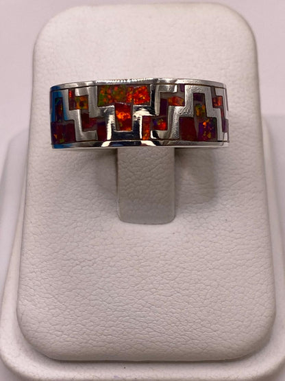 Anillo de Ópalo de Fuego con Diseño Geométrico en Plata Ley 950