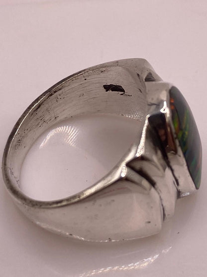 Anillo Ovalado con Ópalo de Fuego Multicolor en Plata .925, sello de autenticidad Plata Ley .925