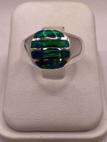 Anillo en Plata Ley 950 con Ópalo de Fuego Diseño Ovalado Segmentado