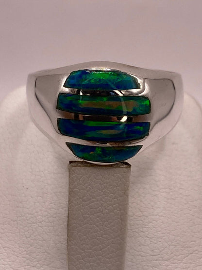 Anillo en Plata Ley 950 con Ópalo de Fuego Diseño Ovalado Segmentado