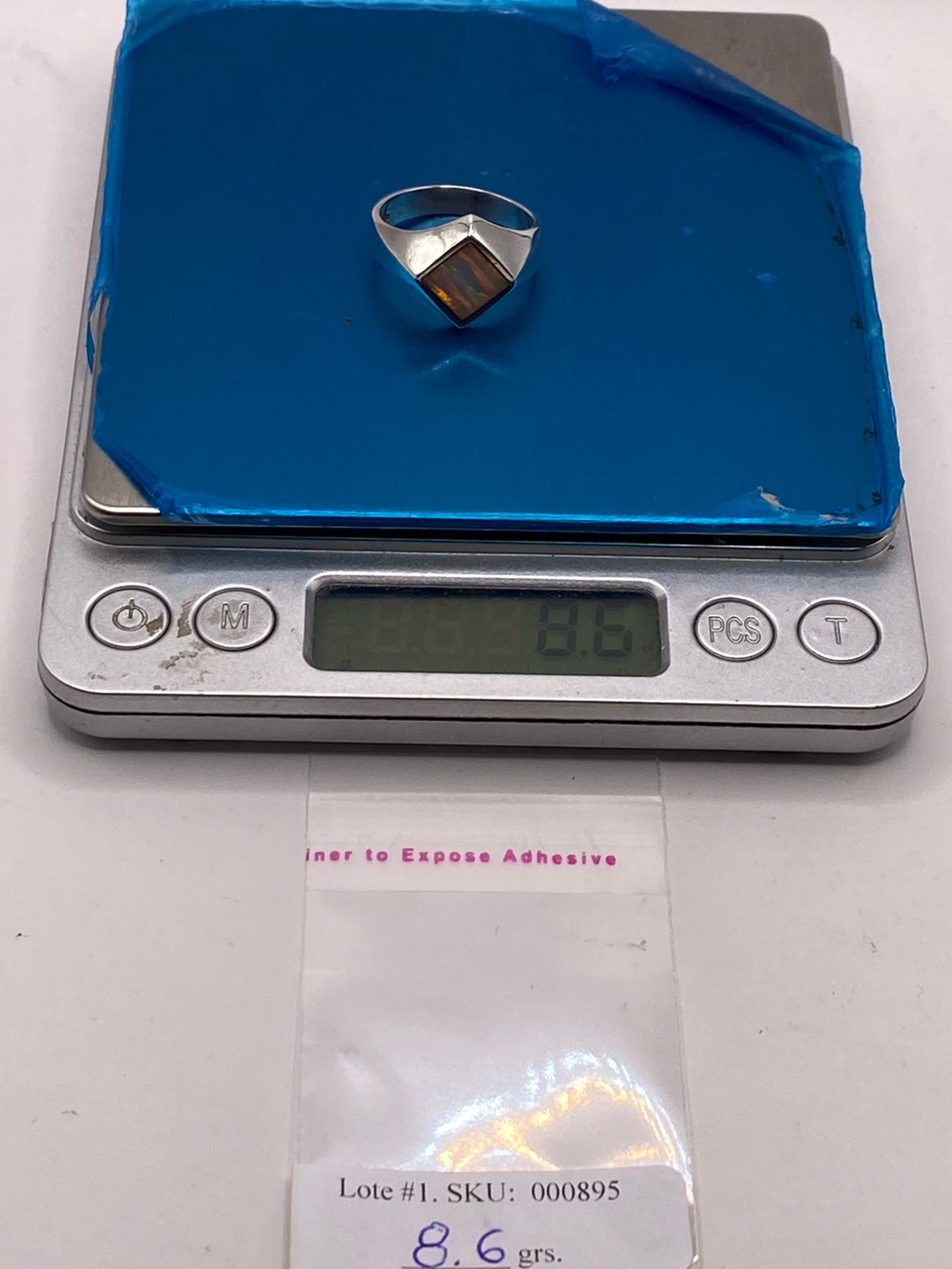 Anillo de Plata Ley 950 con Ópalo de Fuego en Montura Romboidal
