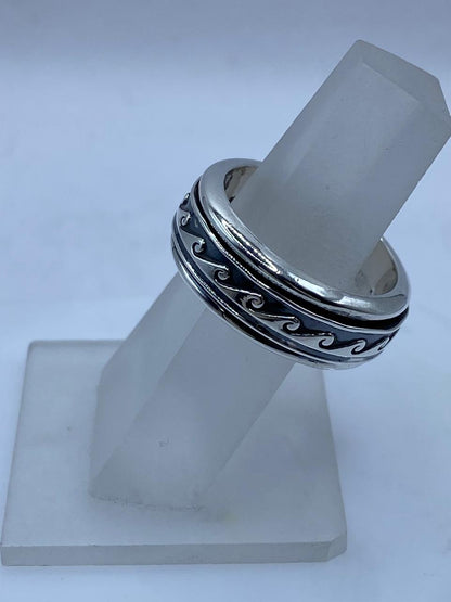 Anillo Spinner Olas Estilizadas en Plata .925, vista lateral